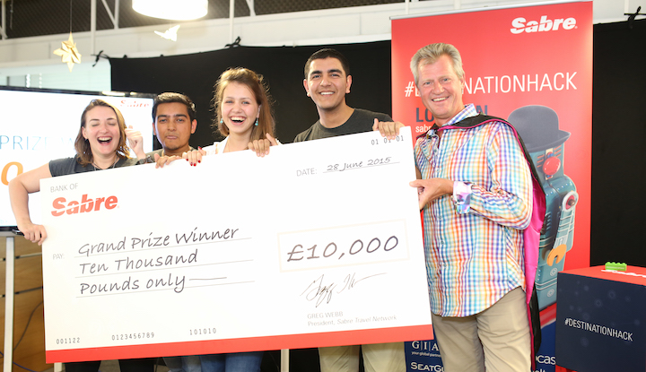 Developers of winning app, Travita, collect their prize from Greg Webb, president of Sabre Travel Network